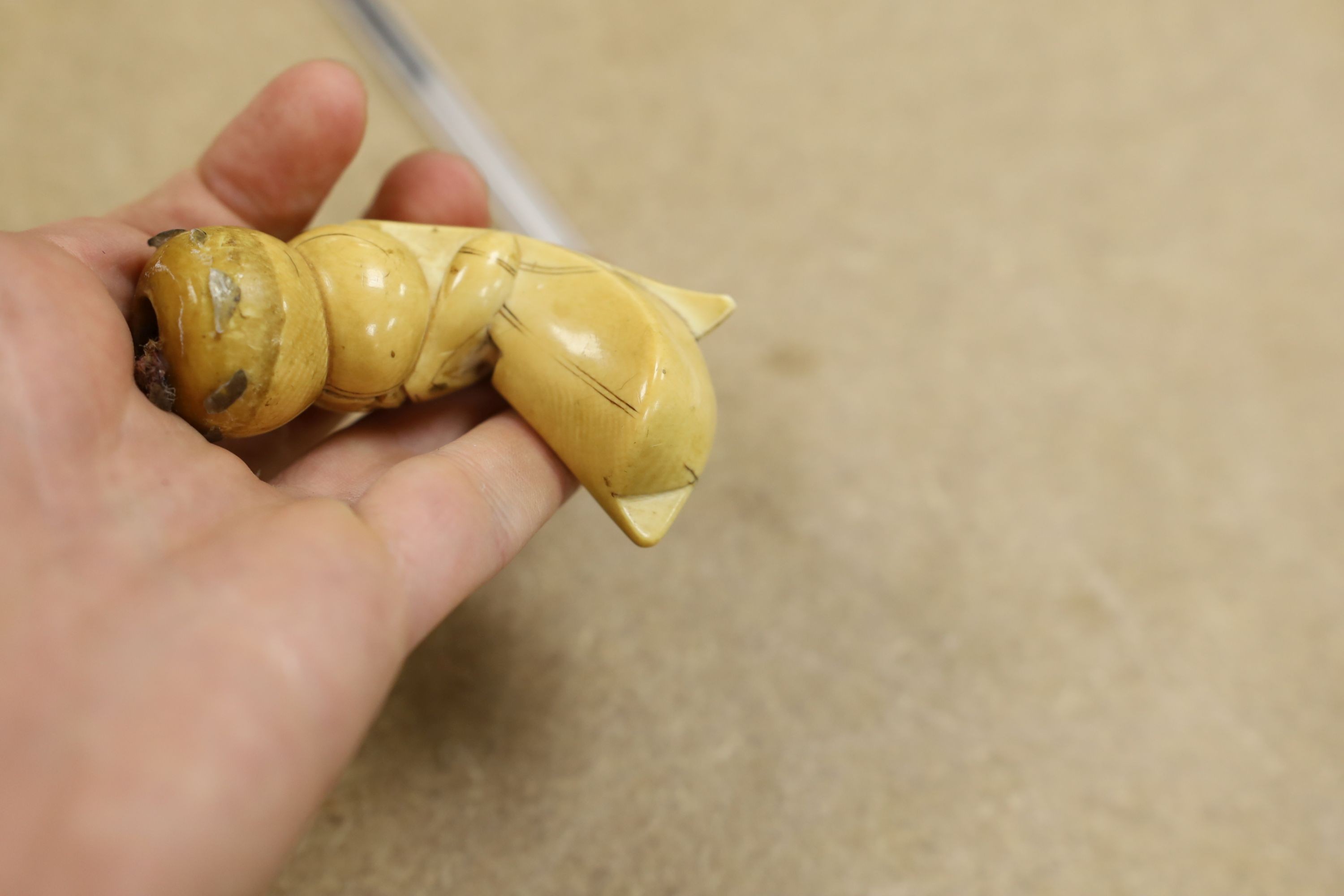 A 19th century ivory handled Kris, 40 cms long.